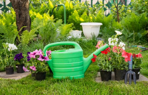 Local gardeners maintaining a neat and healthy Hampton garden